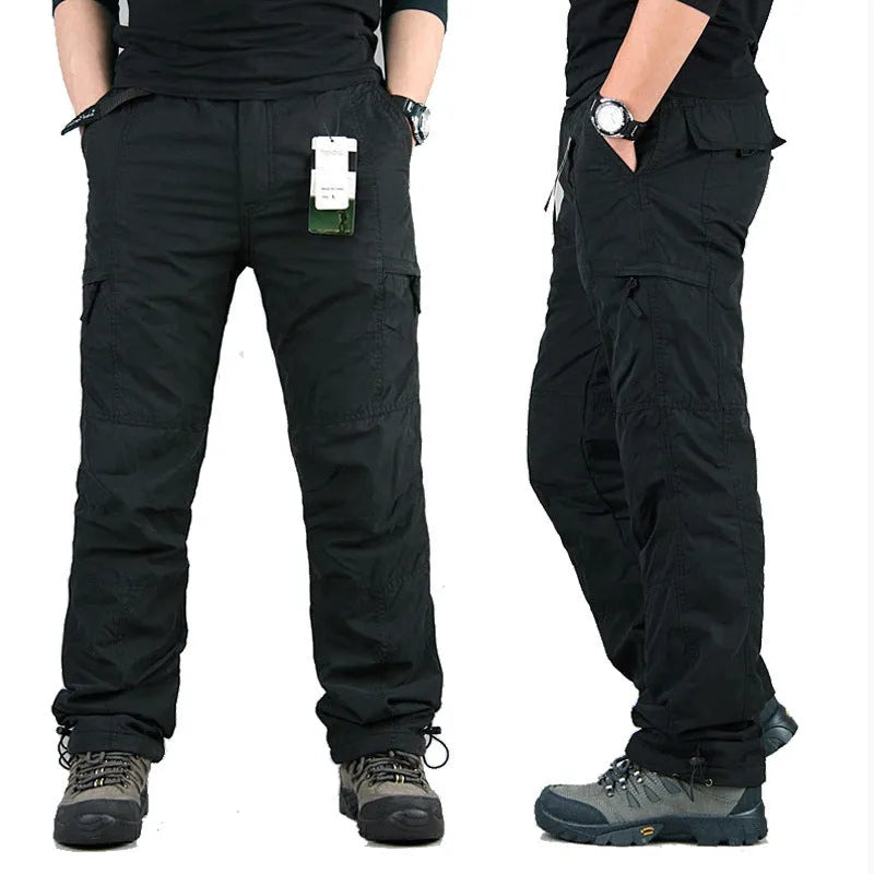 Men's thick cotton velvet overalls in Army Green, loose fit with straight legs, stone wash finish.