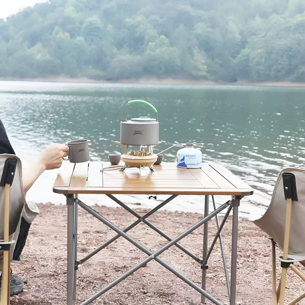 Portable windproof gas stove in black or khaki for camping and picnics, suitable for 1-2 people