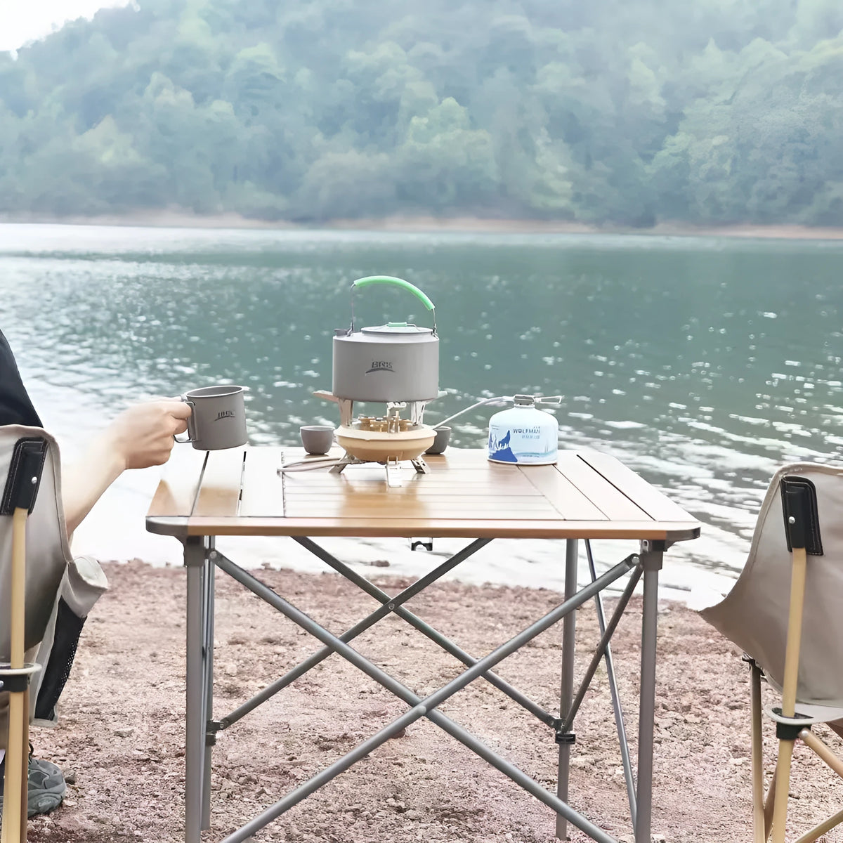 Portable windproof gas stove in black or khaki for camping and picnics, suitable for 1-2 people