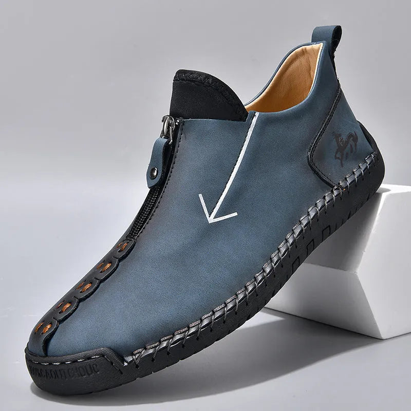 Men's black leather martin boots with front zipper and round toe design on rubber sole