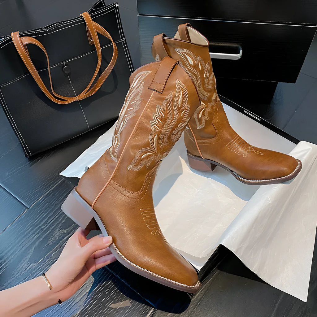 Brown women's mid-calf embroidered Martin boots with a round toe and low square heel