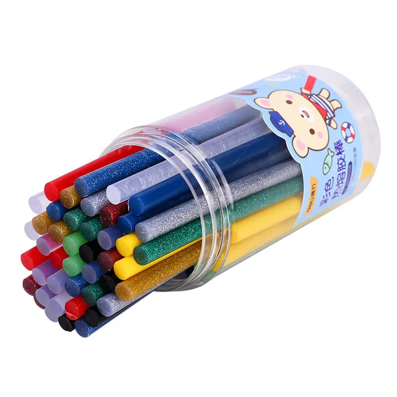 55 transparent hot melt adhesive sticks with 7mm diameter in packaging measuring 63x121mm