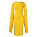 Yellow long sleeve evening gown with high waist and pleated shawl detail on a mannequin.