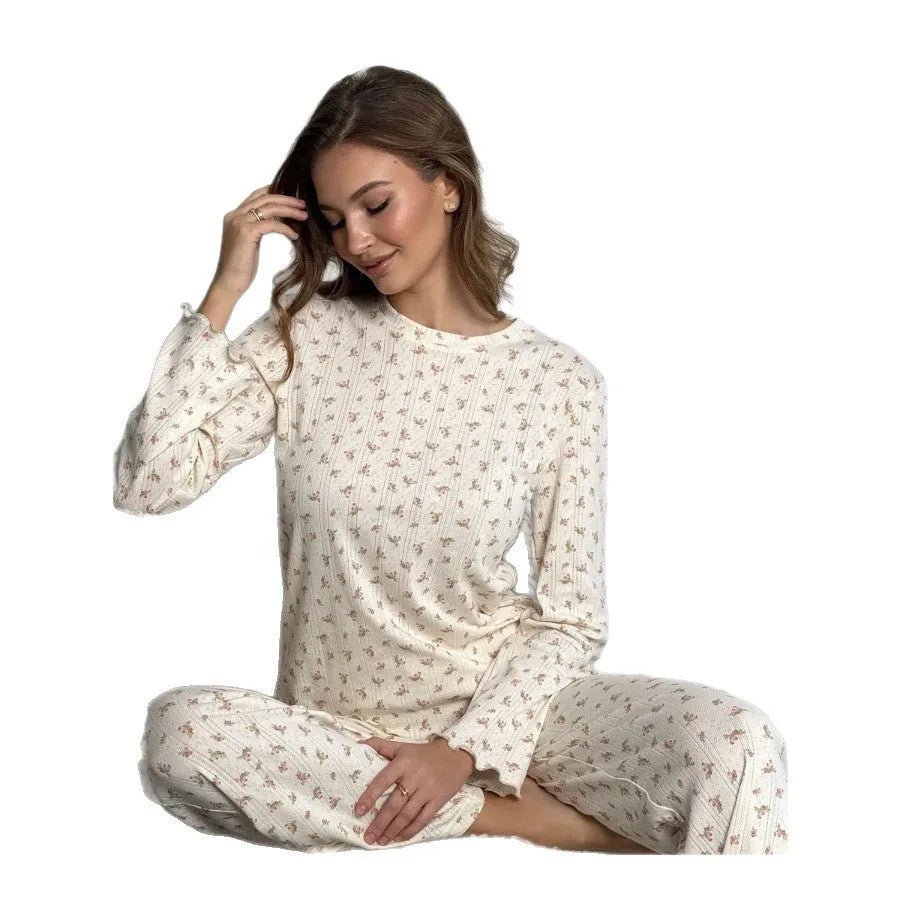 Women's white floral print bell sleeve top and matching wide leg trousers suit set