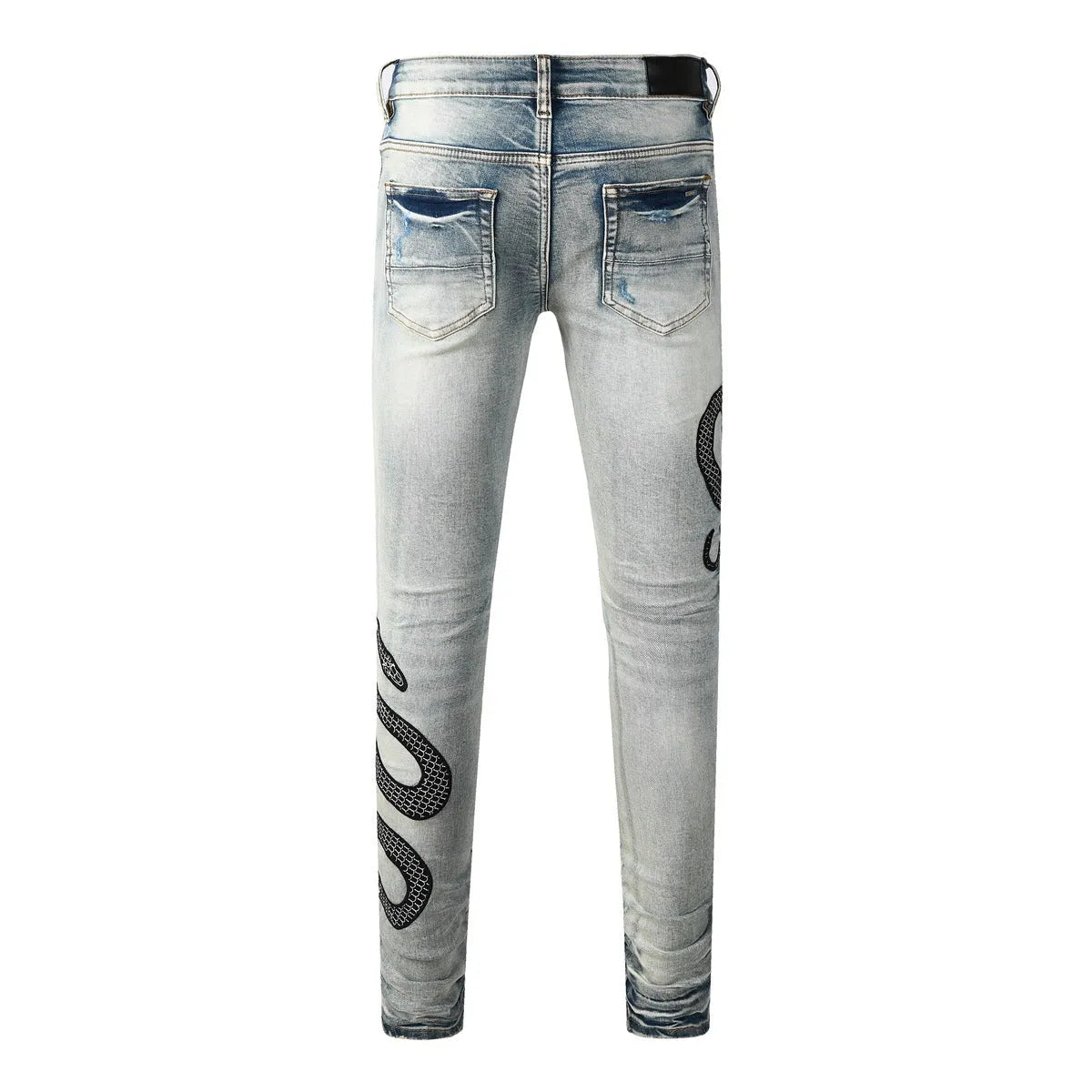 Blue distressed wash skinny jeans with mid waist and skinny leg silhouette