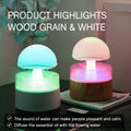 White cloud-shaped ultrasonic humidifier and aroma diffuser with multi-colour LED night light