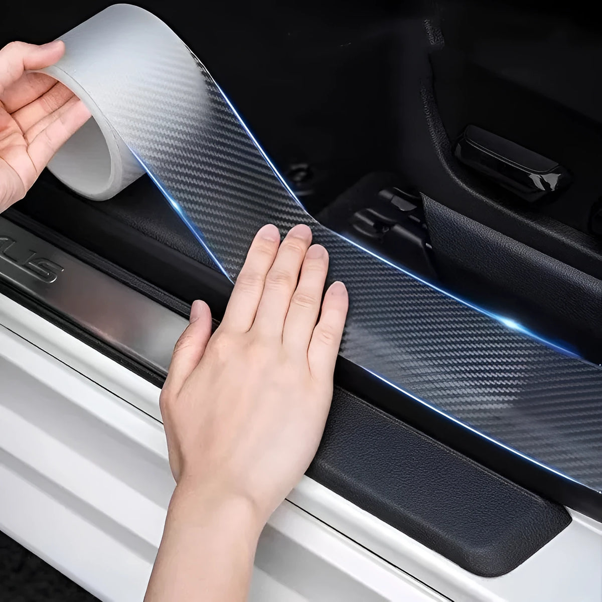 Roll of transparent carbon fibre texture anti-collision strip for car door protection.