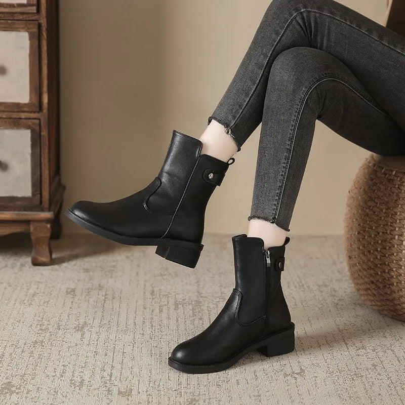 Black women's low heel short boots with round toe and side zipper made of artificial PU