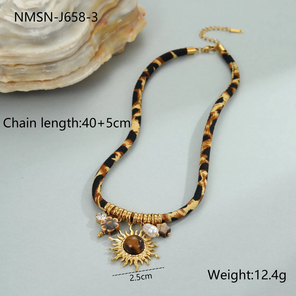 Geometric leopard pendant stainless steel necklace with gold-toned electroplated finish and adjustable chain