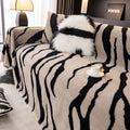 Zebra pattern flannel sofa cover and pillowcase in caramel colour on a sofa