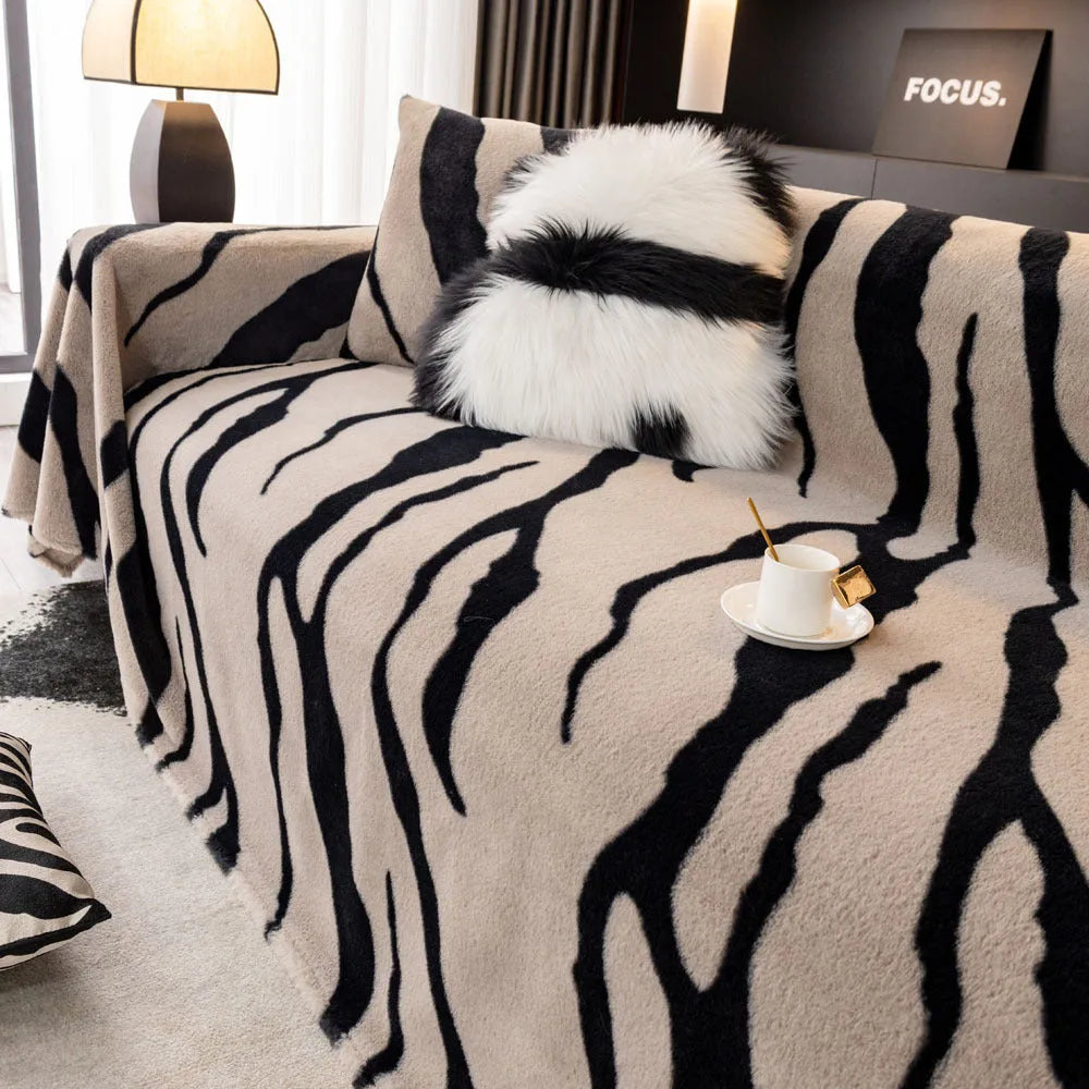 Zebra pattern flannel sofa cover and pillowcase in caramel colour on a sofa