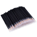 Pack of 100 disposable ultra-fine tip eyeliner brushes with protective plastic sleeves