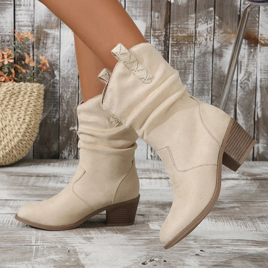 Women's plus size mid-calf suede boots with a short stout heel in lotus root colour.