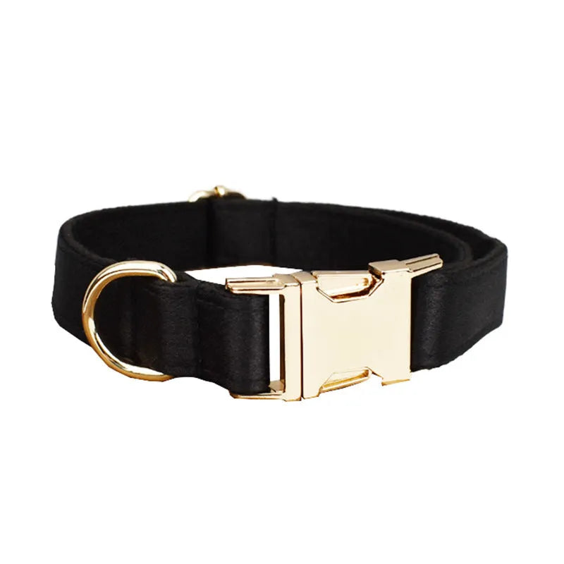 Cloth dog collar, leash, harness vest, and decorative bow set shown together in packaging.