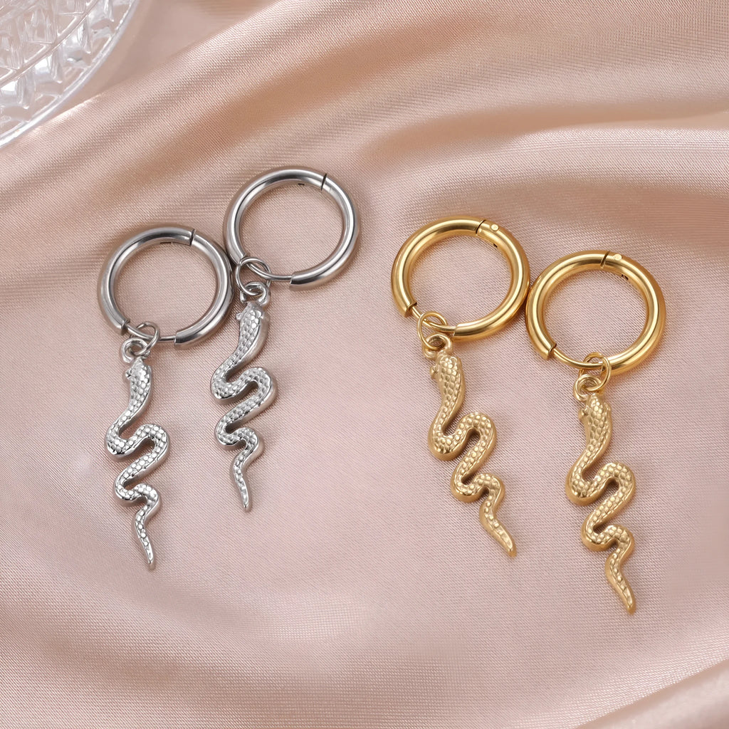 Gold snake clip-on earrings in vintage animal zodiac design