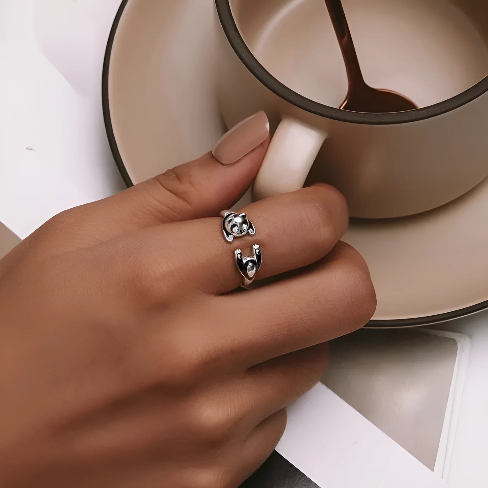 Adjustable sterling silver ring with panda design and white gold plating