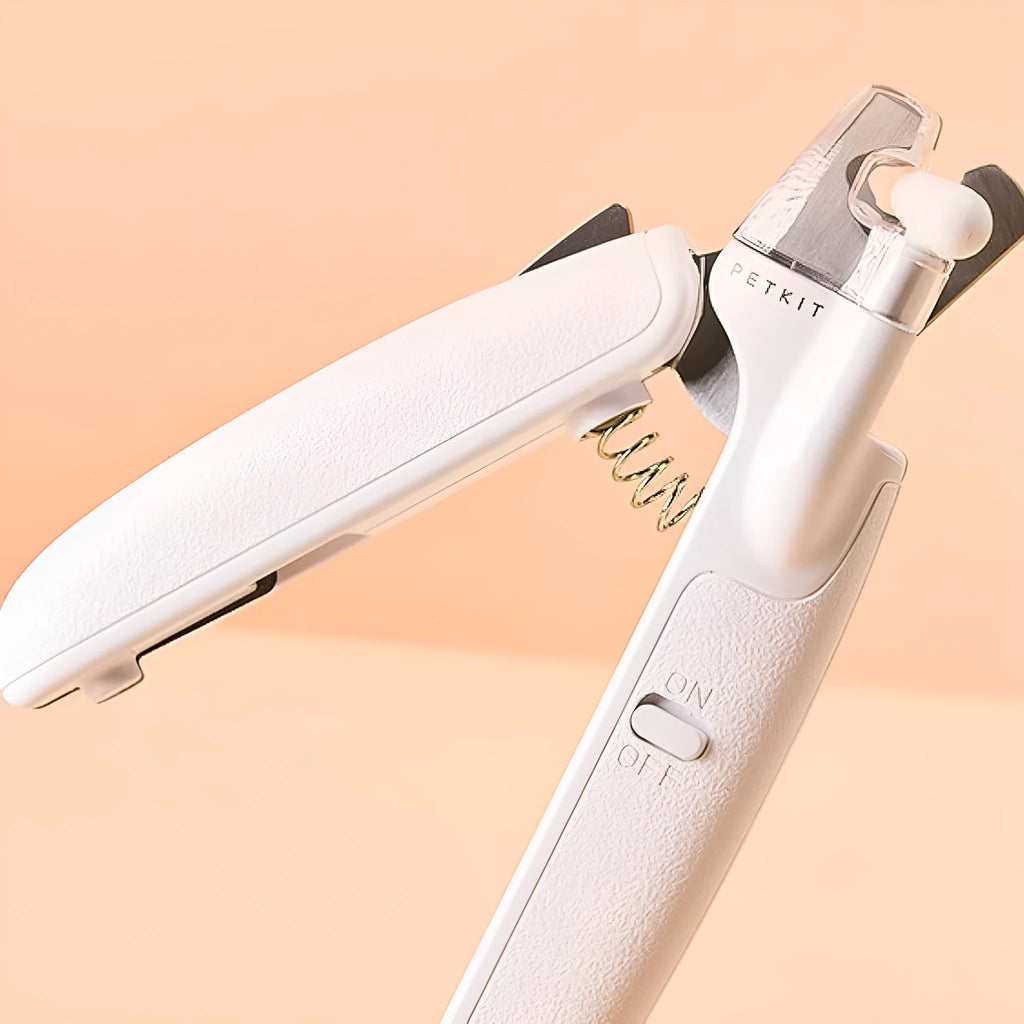 White LED pet nail clipper with transparent anti-splash guard and nail file.