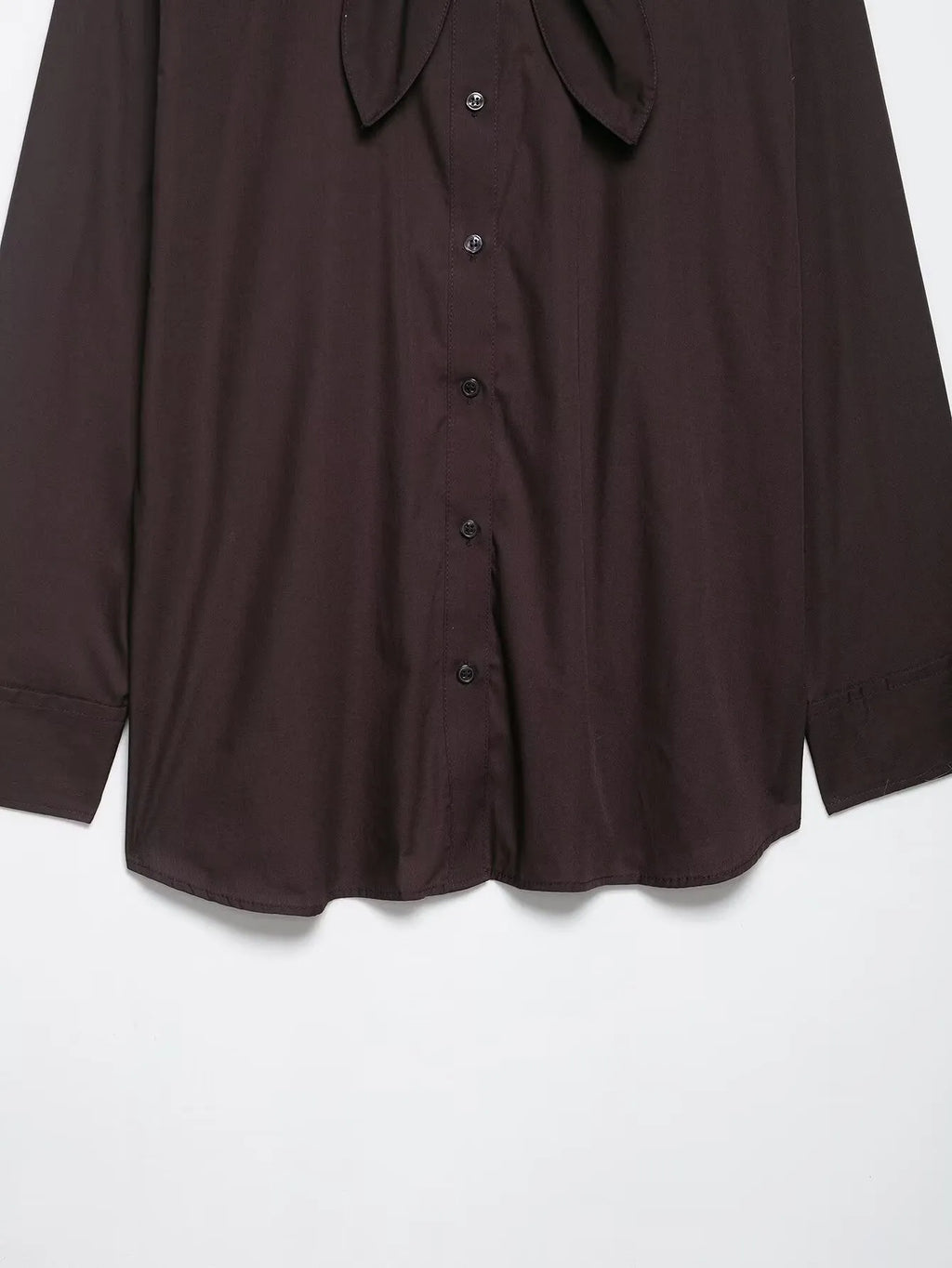 Brown women's long sleeve poplin shirt with a bow tie, shown in a loose cardigan style.