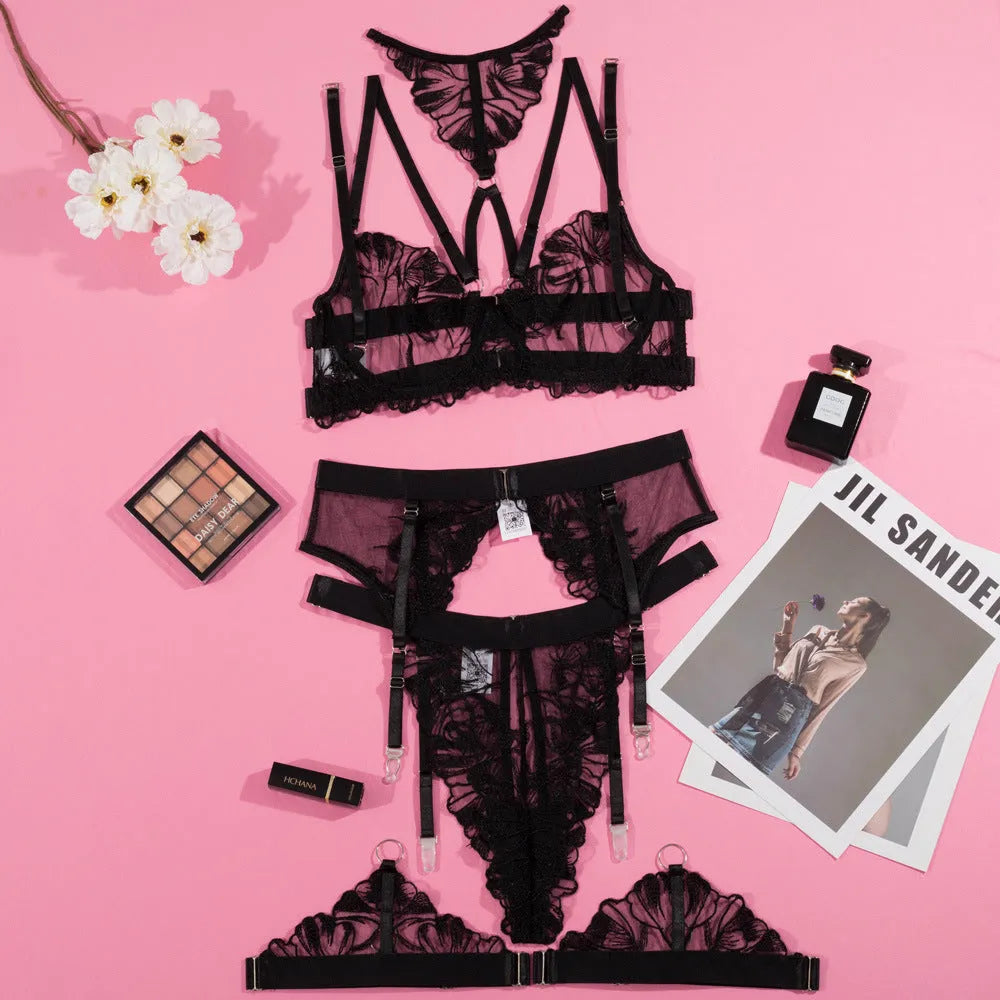 Black women's mesh bra with white embroidery stitching detail, shown from the front.