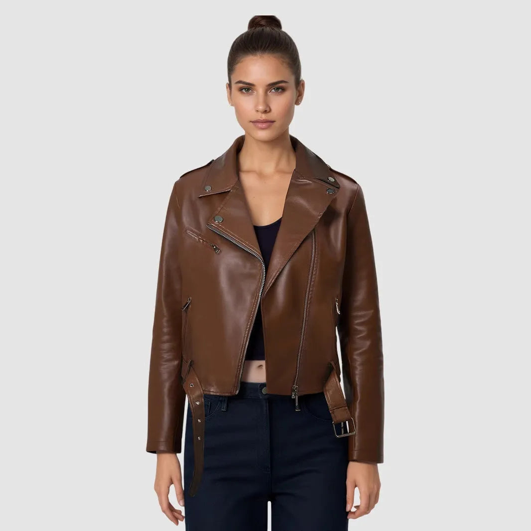 Women's red PU leather motorcycle jacket with belt lapel design on a hanger