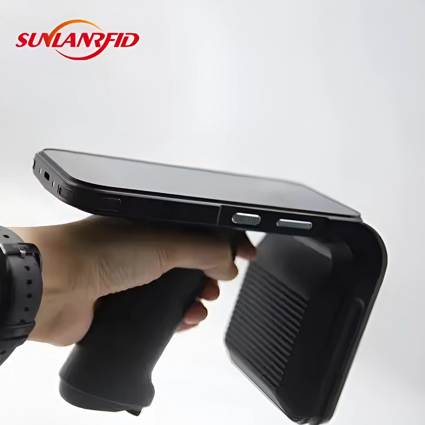 SLP-05 handheld Android UHF RFID reader and scanner unit on a warehouse table