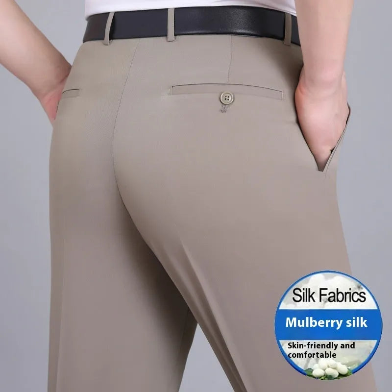 Men's straight-cut non-iron business trousers in a mulberry silk blend fabric on a hanger.