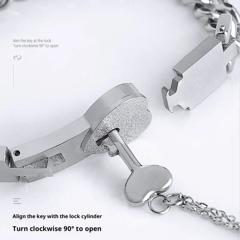 Interlocking peach heart key necklace and bracelet set in titanium stainless steel, shown in steel, black, and golden colour options
