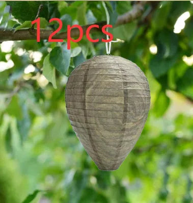 Hexagonal beehive lantern with paper and wire construction measuring 22cm by 28cm