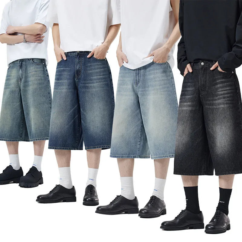 Men's loose straight-leg cropped denim shorts in light blue on a mannequin.