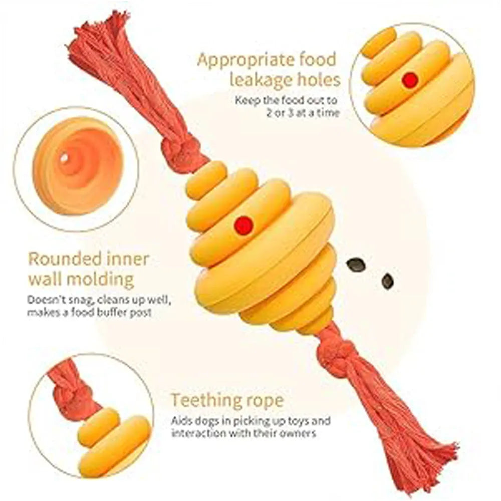 Green and yellow silicone dog ball with attached rope for tug-of-war and treat dispensing