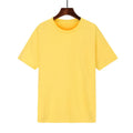 Men's loose black cotton t-shirt with short sleeves on a hanger, showing printed design detail.