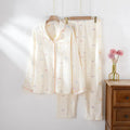 Women's cotton pajama set in beige with long sleeves and trousers