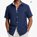 Men's grey floral print short-sleeved casual shirt laid flat, showing regular fit and lightweight polyester fabric.