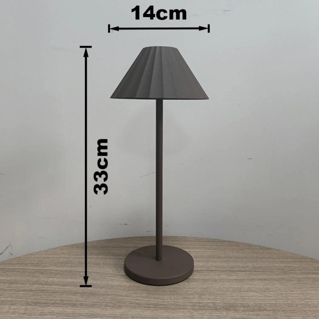 Alloy desk lamp in black finish with a touch-sensitive base for dimming control.