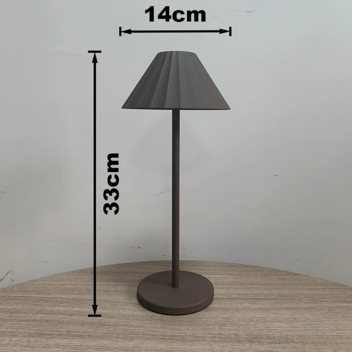 Alloy desk lamp in black finish with a touch-sensitive base for dimming control.