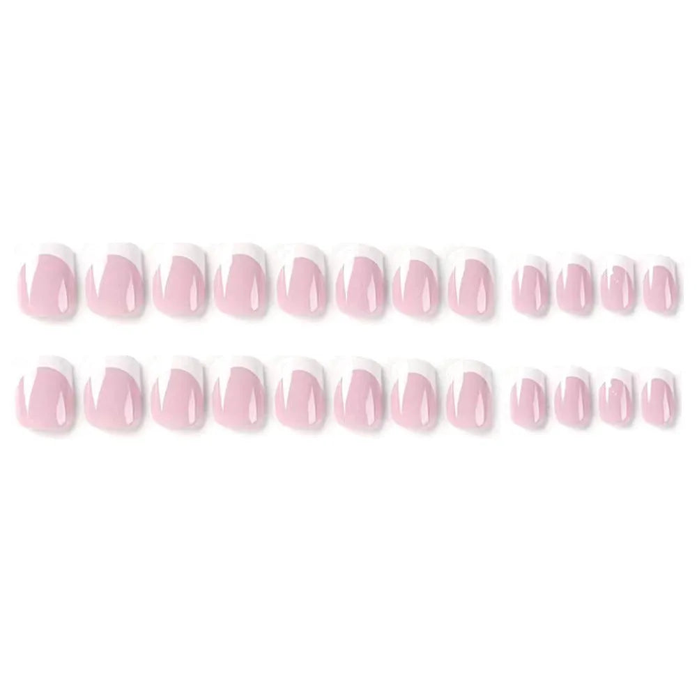 24 white plaid-patterned plastic fake nail tips arranged showing design detail