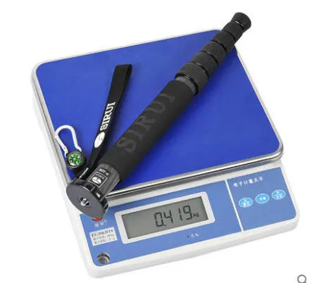 Black carbon fibre SLR camera monopod extended to full height