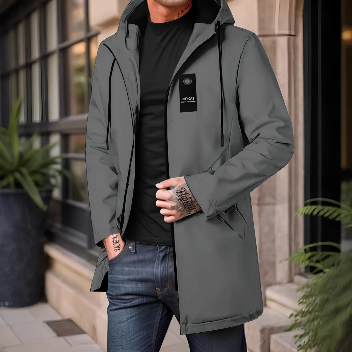 Men's mid-length hooded shell jacket in grey polyester fibre with long sleeves and windproof design