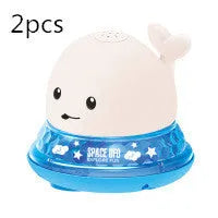 Automatic spray whale bath toy with LED lights floating in water