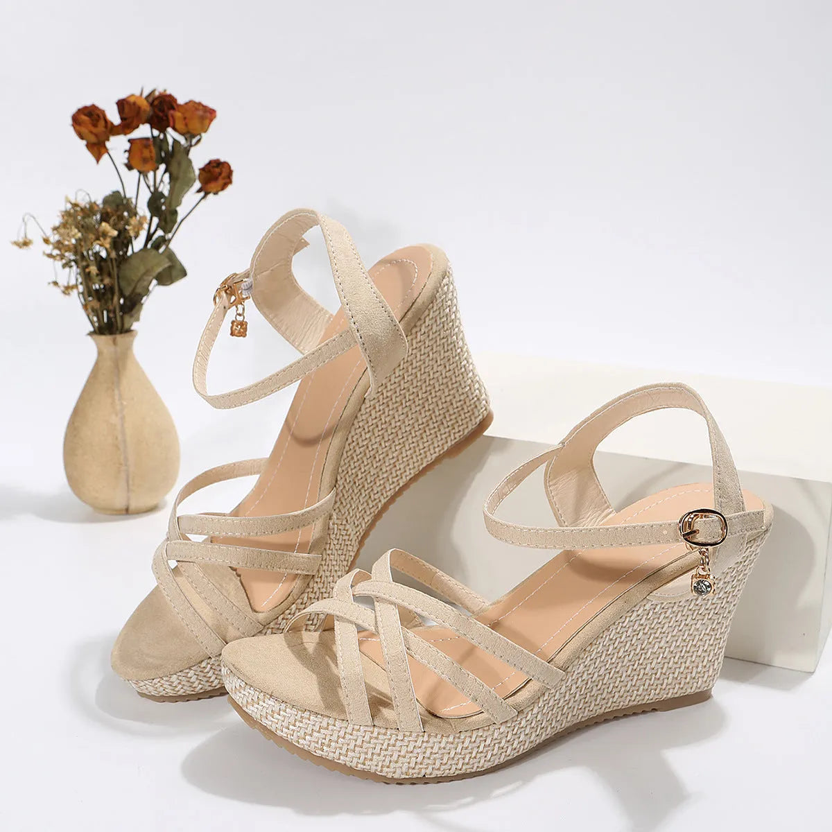 Women's black wedge sandals with fish mouth toe open design and fabric upper.