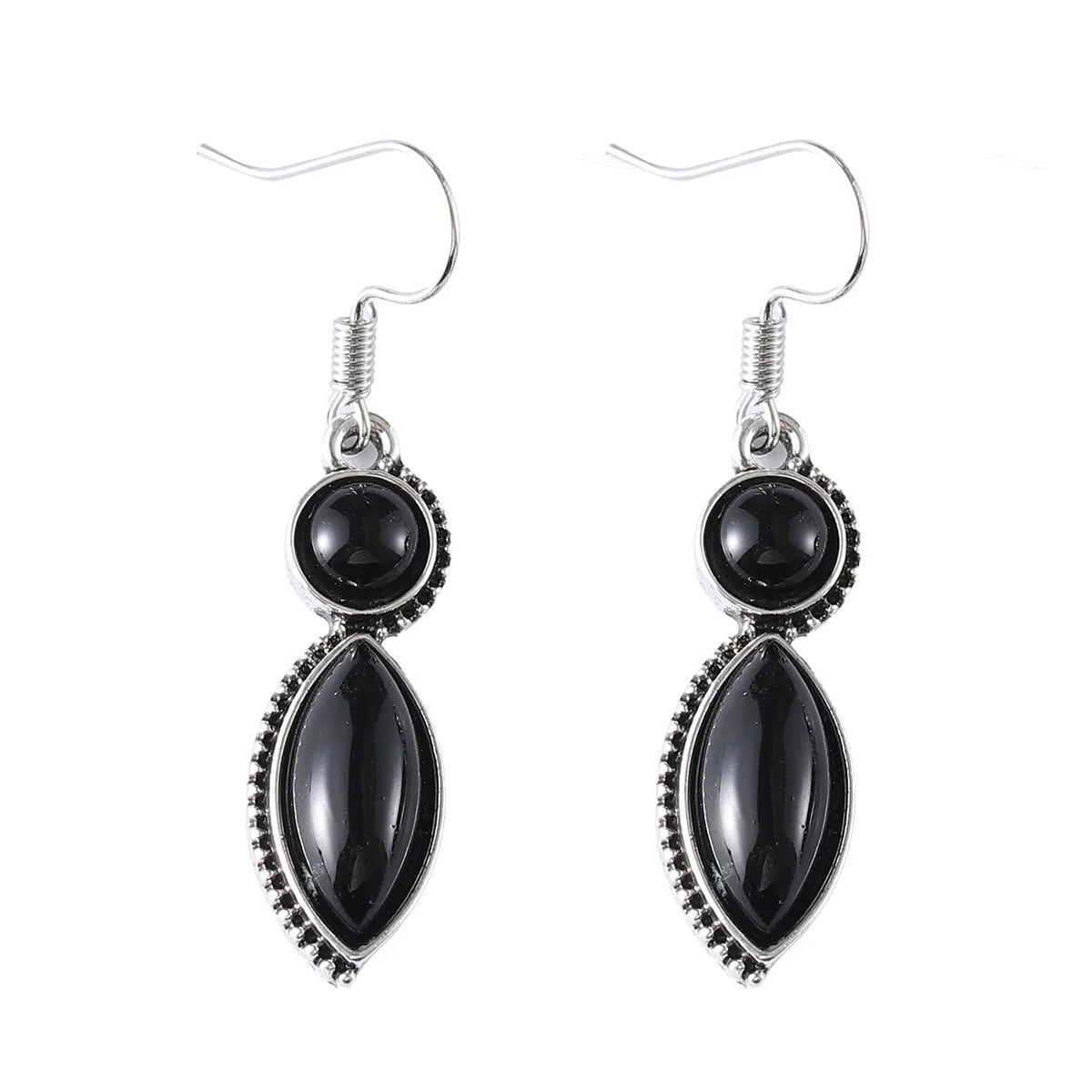Pair of vintage geometric pendant earrings in black and purple zinc alloy with round retro design