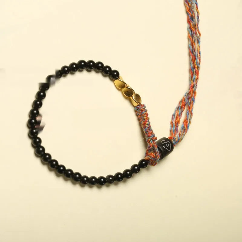 Hand-woven obsidian colour bracelet with 4mm width and 15.5-16cm length shown as wearable accessory