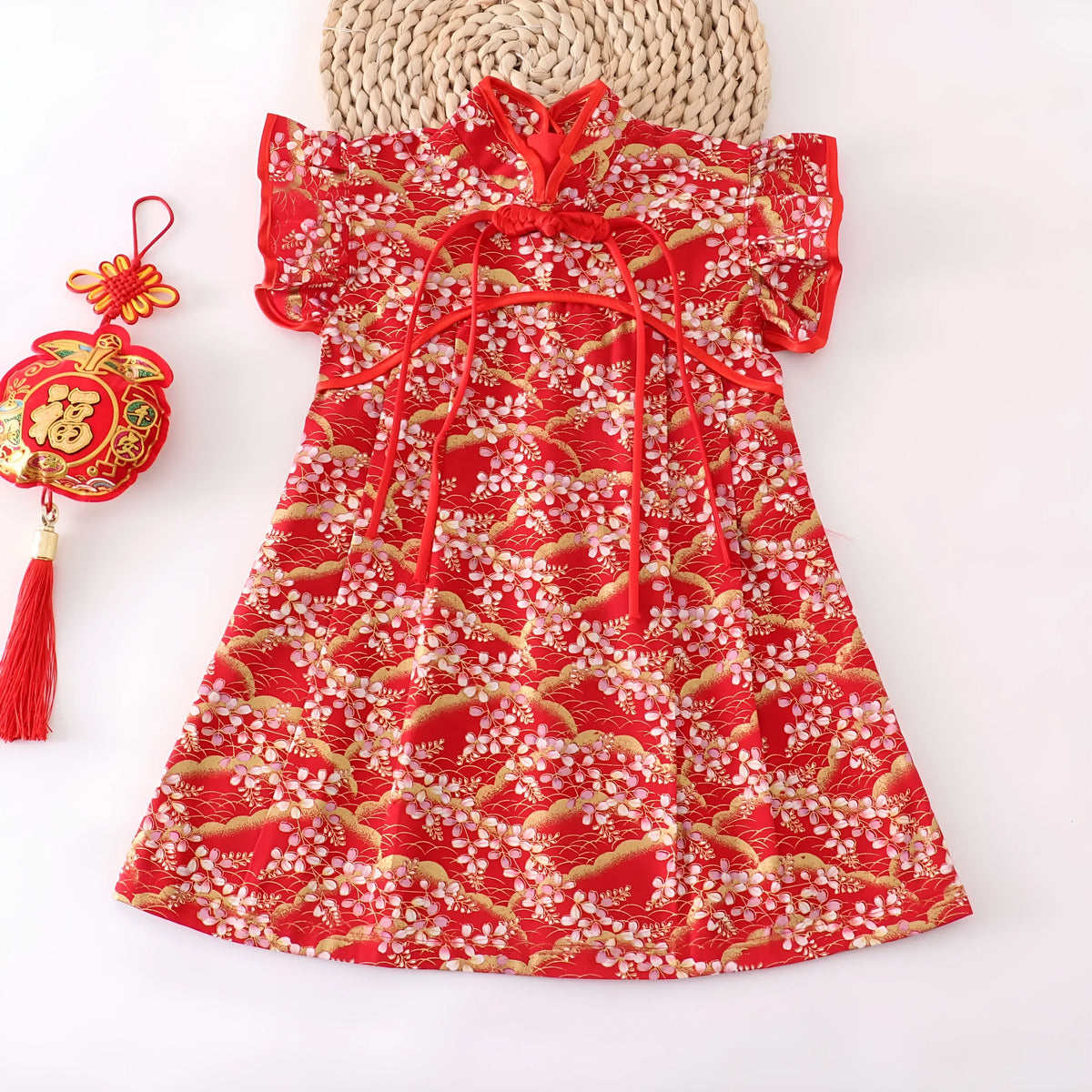 Girls Chinese style cotton dress in red small floral with splicing detail, available in heights 80cm to 150cm.