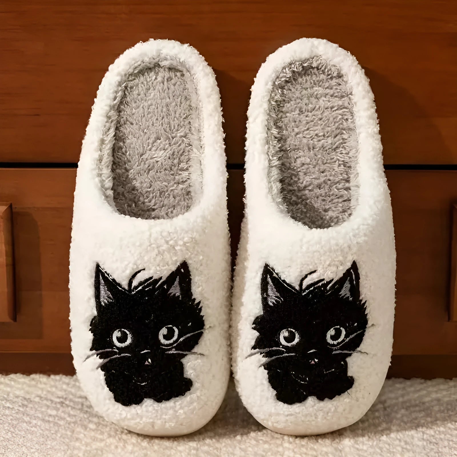White plush slippers with Black Beard cartoon cat couple pattern and non-slip sole.