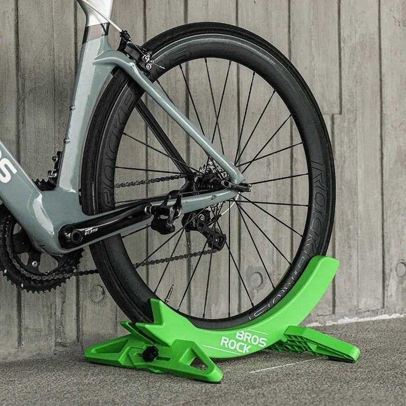 Black and green ABS plastic bicycle parking rack holder for wall mounting
