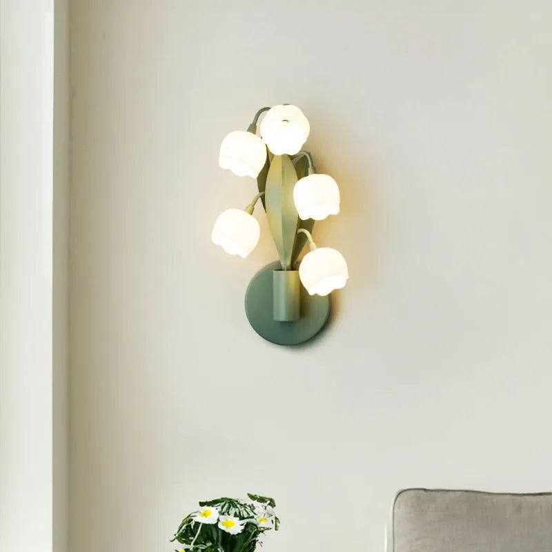 Green-tricolour French pastoral style wall lamp with a white minimalist PC shade mounted on a bedroom wall.
