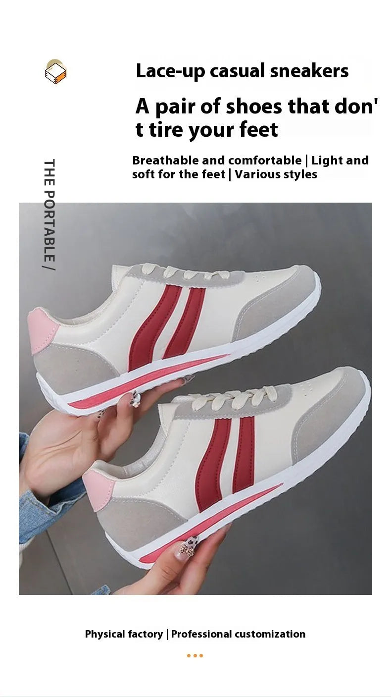 Red and blue low-top lace-up leisure sneakers with round toe and rubber sole.