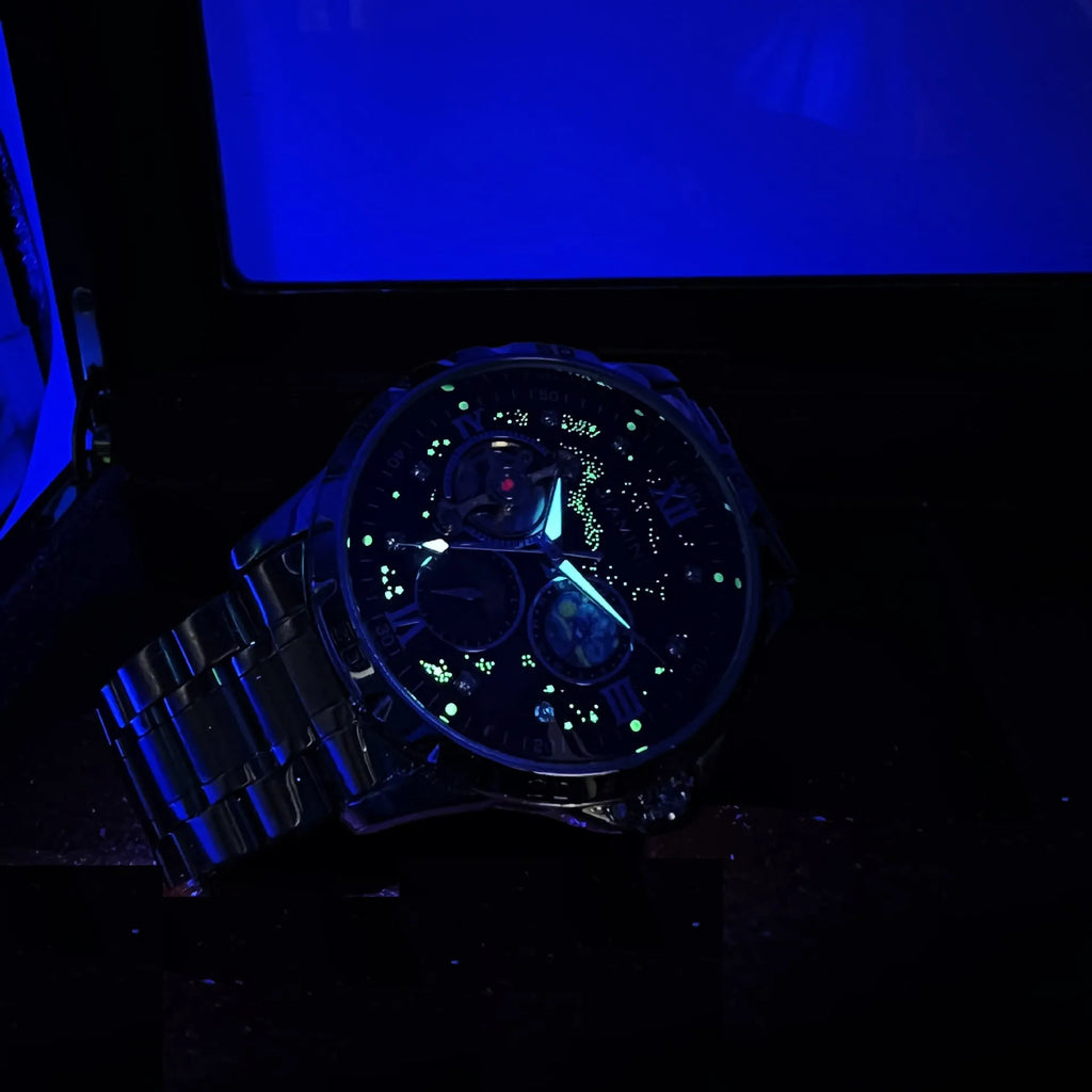 Automatic mechanical men's watch with rose gold case, black dial, and large multifunctional display