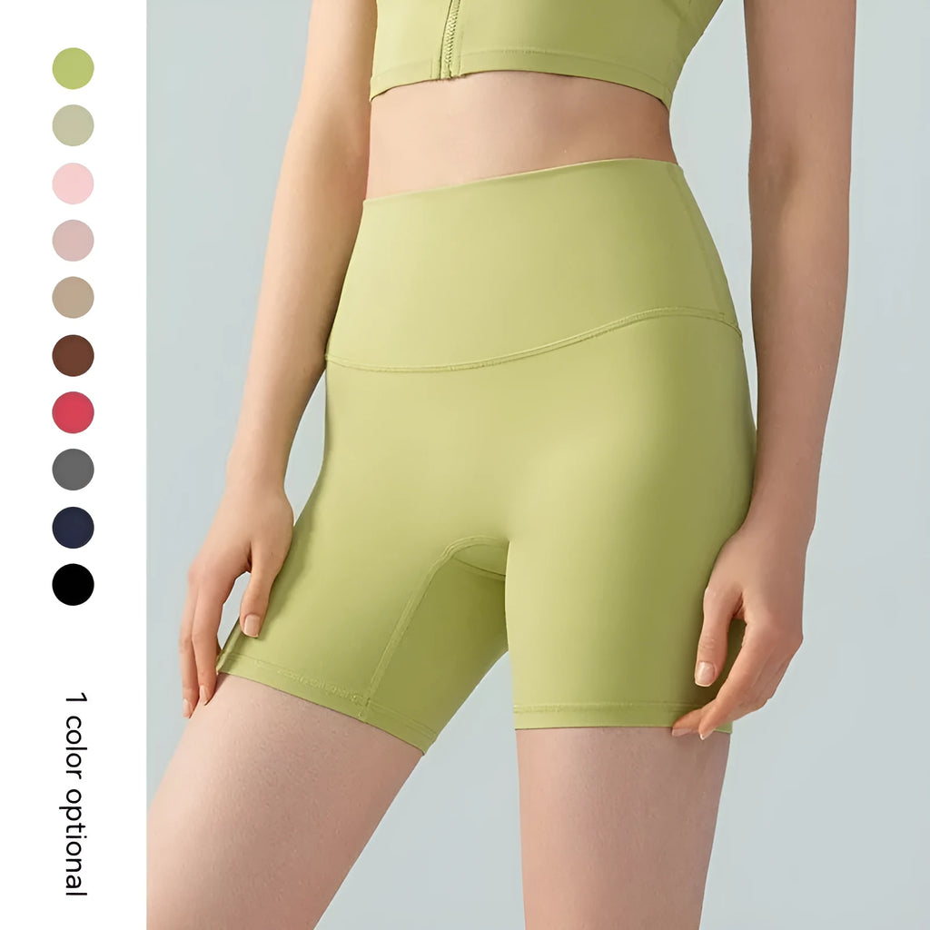 Women's high waist Lycra yoga shorts in leaf green colour, short length for fitness.