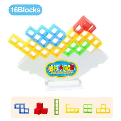 Plastic balance stacking game with 16 coloured blocks, chassis, and base on a table.